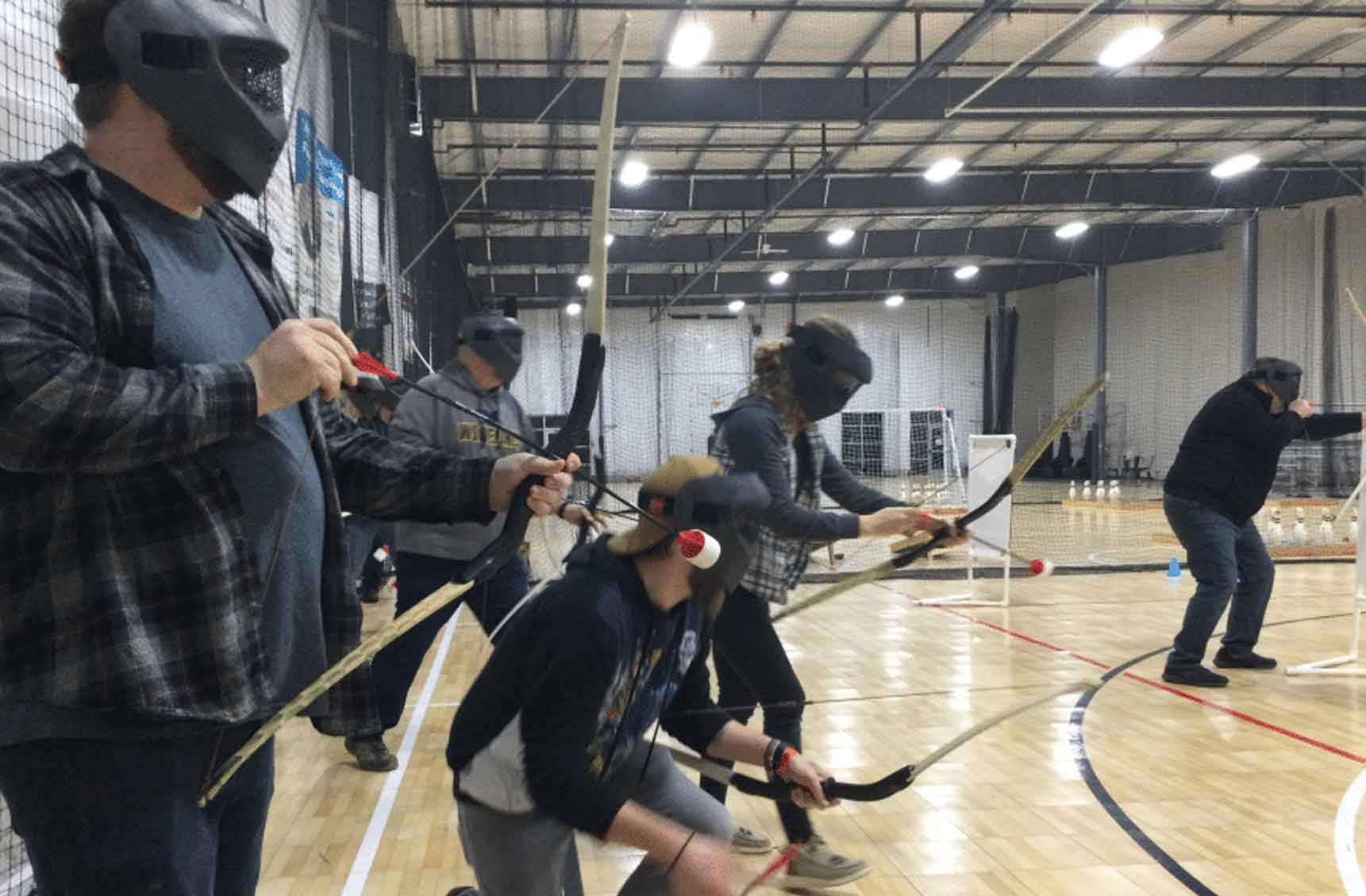 Corporate team playing archery tag at BGR Event Center